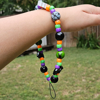 This is Halloween Beaded Wristlet Phone Charm