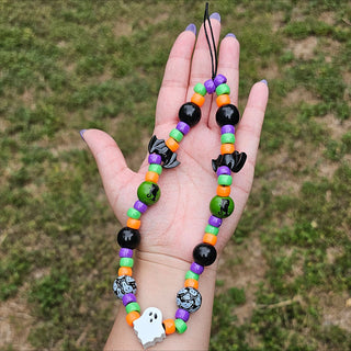 This is Halloween Beaded Wristlet Phone Charm